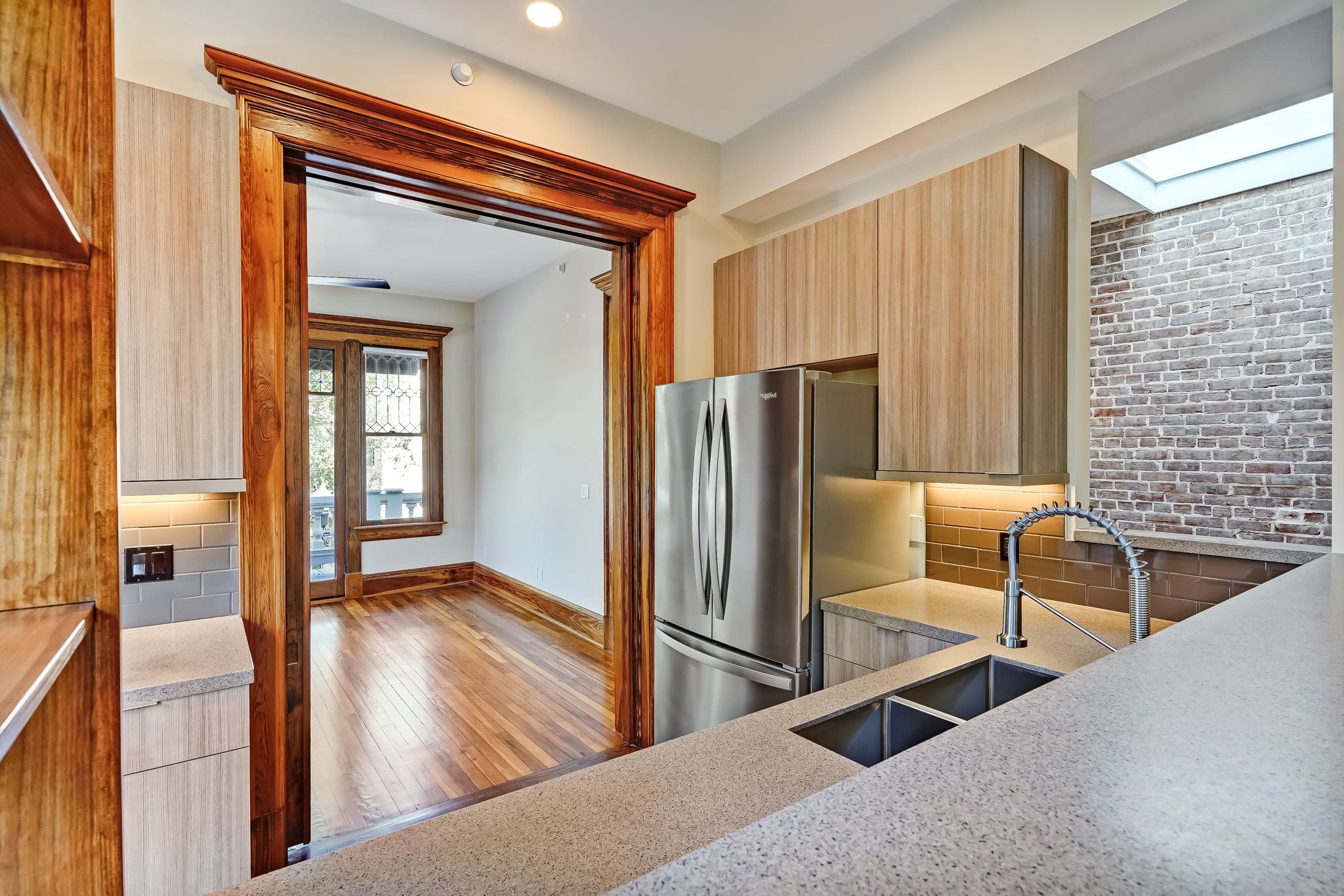 Kitchen view with fridge