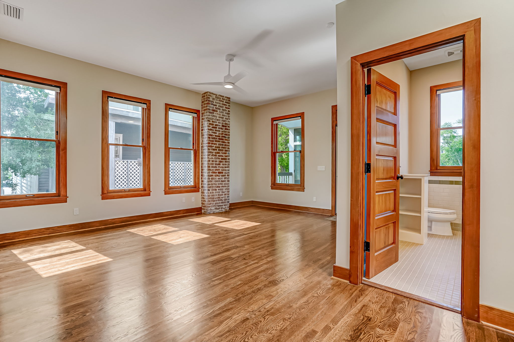 Main room with door to bathroom